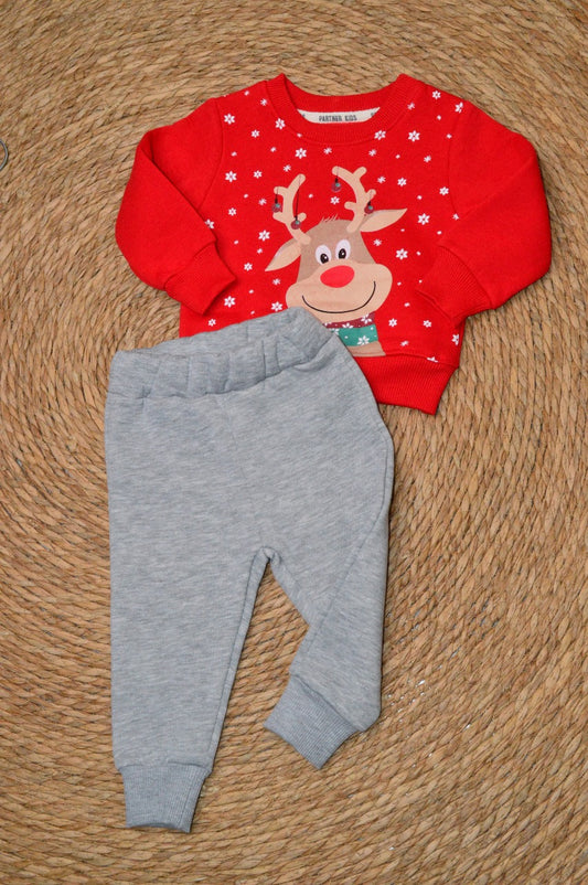 Red fleece top with a reindeer graphic and gray jogger pants, two-piece kids fleece set.