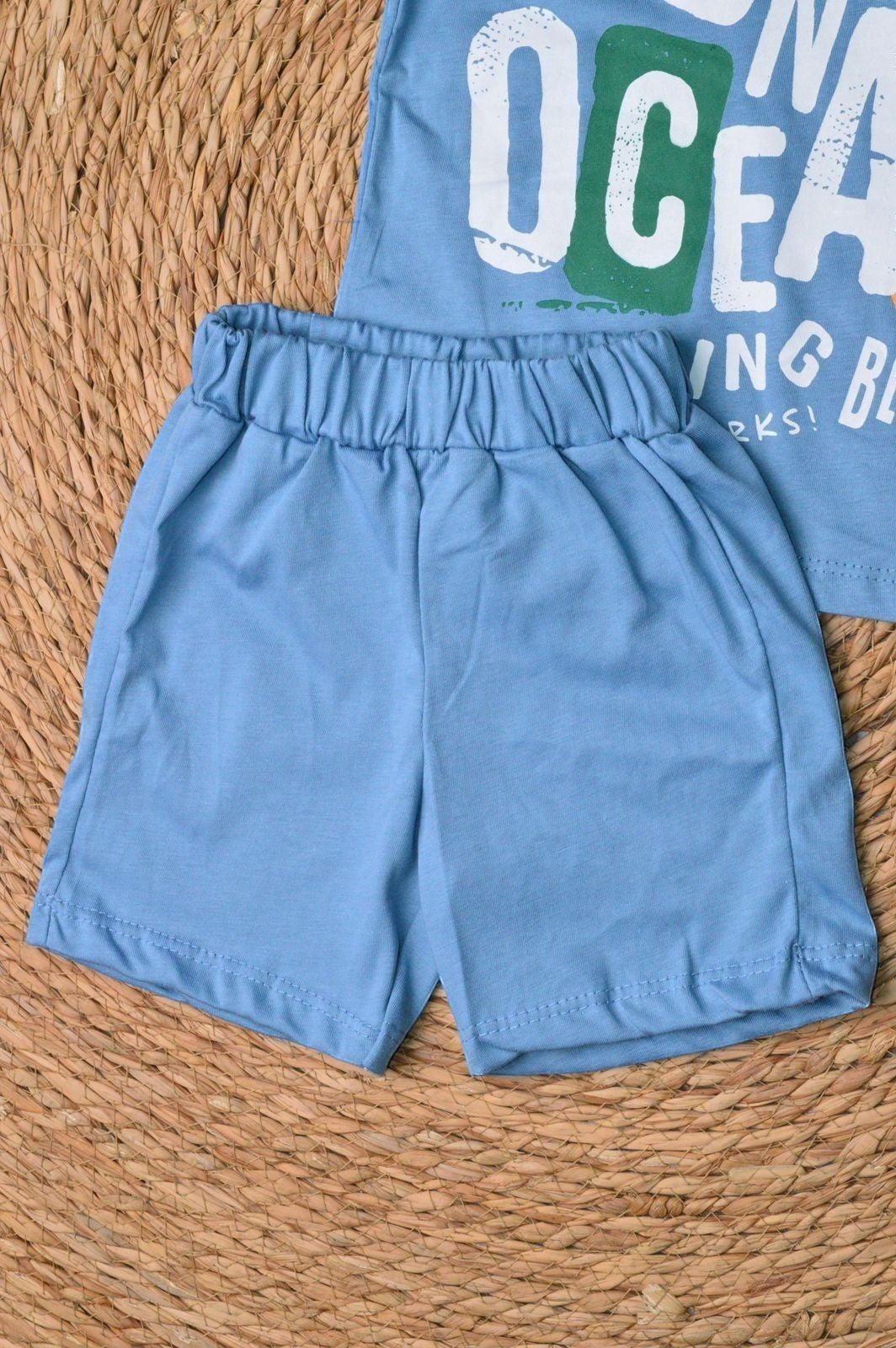 L'armoire De Yasmina light blue cotton shorts with elastic waistband, part of a 2-piece set.
